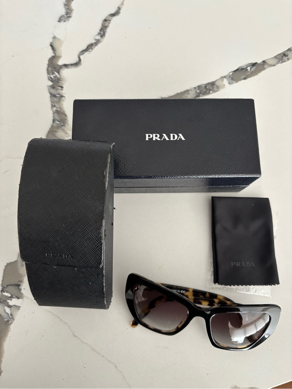 Prada Black Frame Tortoiseshell Temple Sunglasses